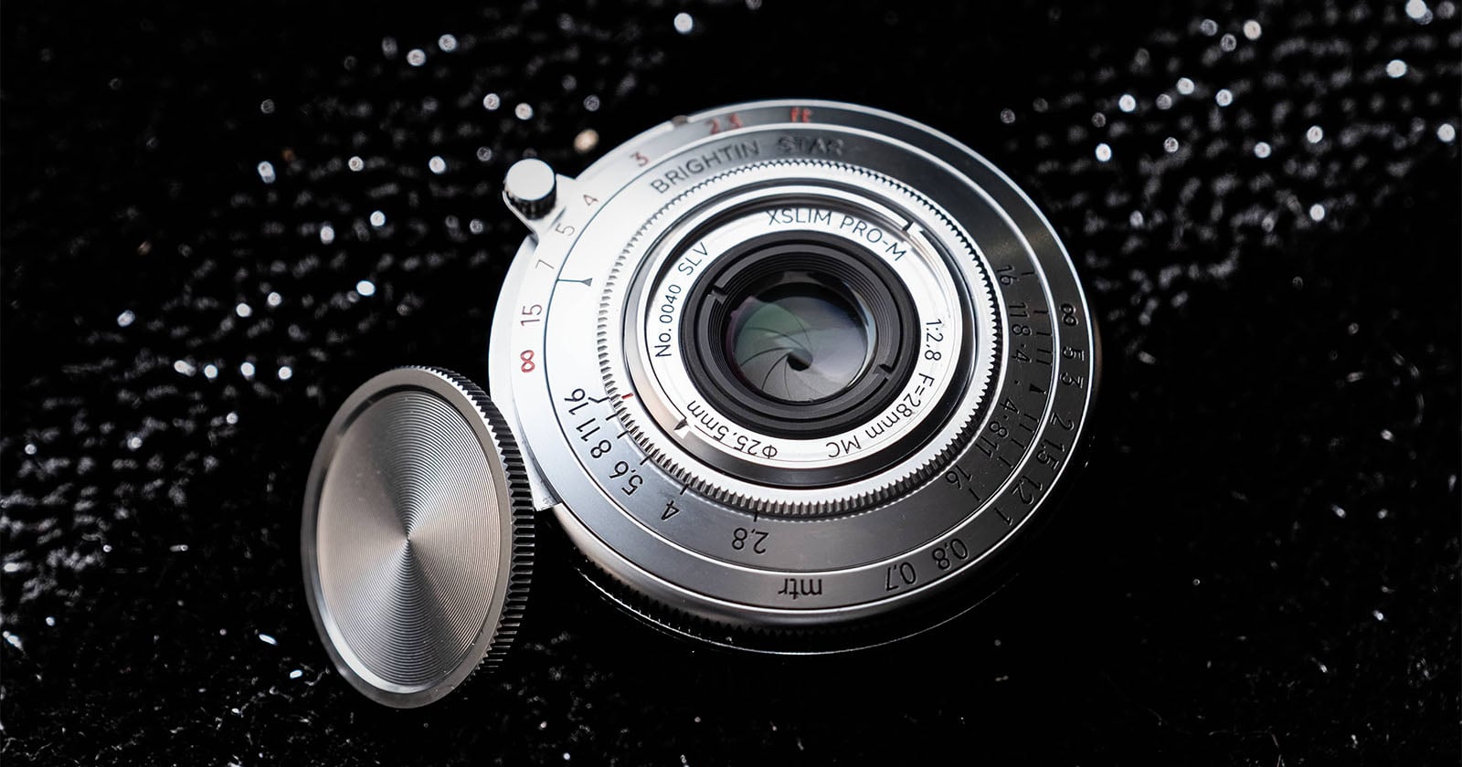 Brightin Star’s Incomprehensibly-Thin 28mm f/2.8 Lens Now Comes In Stylish Silver